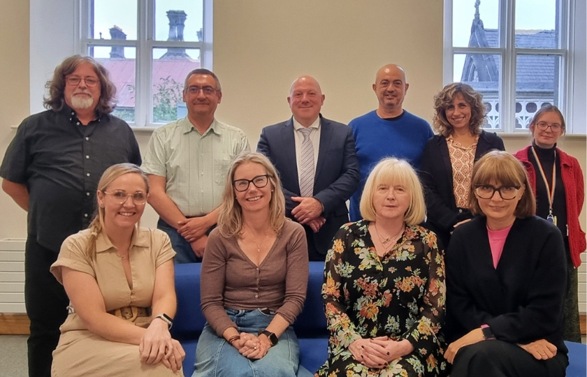 A group called the IDEAL Futures Teacher Academy posing for a photograph after their meeting 