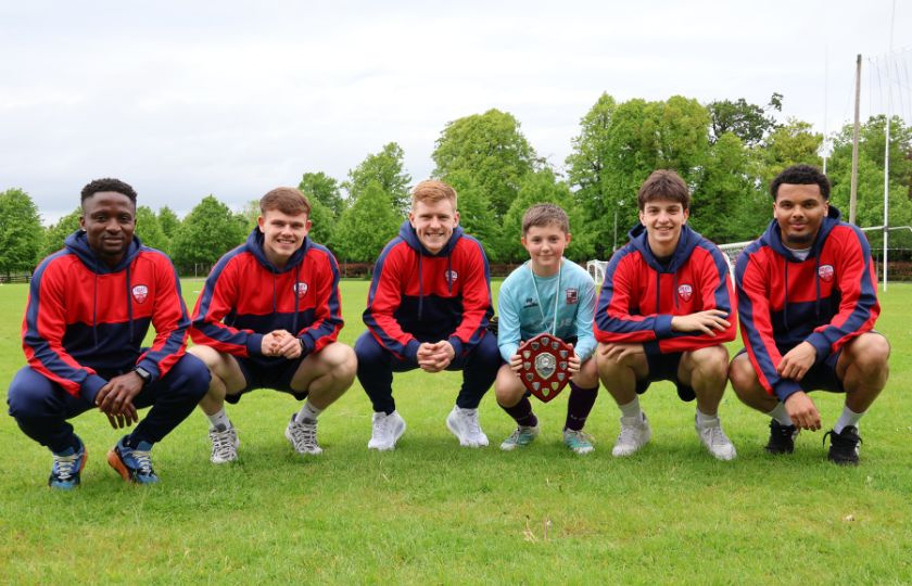 Treaty United players with captain of winning boys team