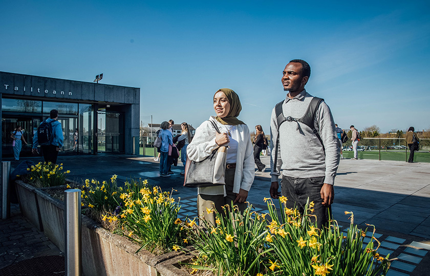 Two students outside the Tailteann sports building