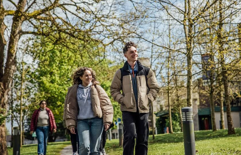 Two students walking on MIC campus Limerick