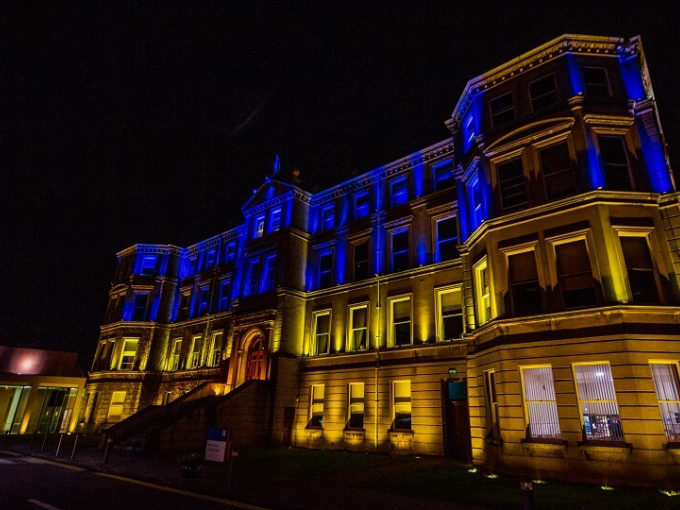 MIC Foundation Building lit up in Ukraine colours
