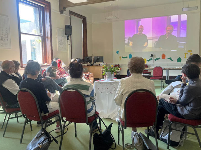 Participants sitting at a round table at the MeDeMap Irish National Citizens Parliament meeting