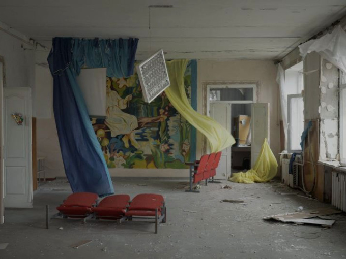 ICTS symposium cover image of room in disarray and curtains blowing in the wind
