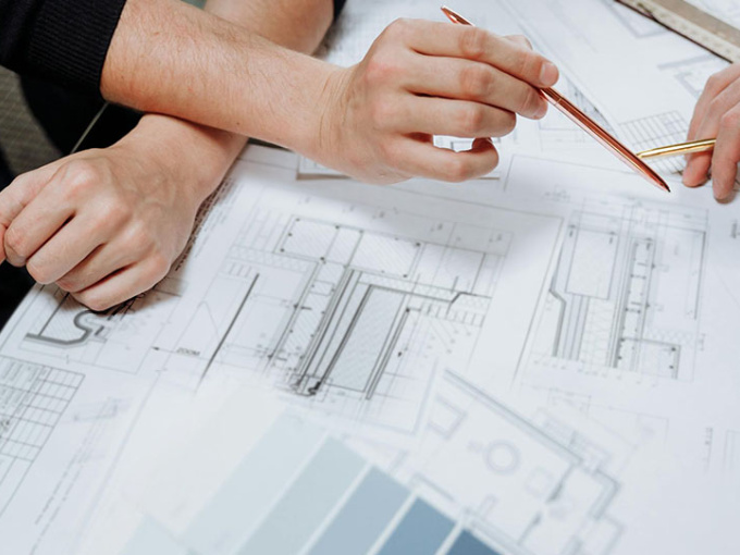 Graphic depicting drawings and design team work