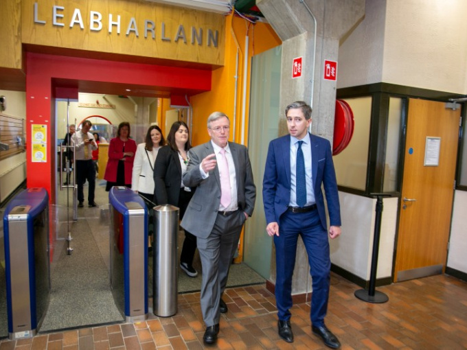 Minister Harris and Prof Eugene Wall at the entrance to the MIC library