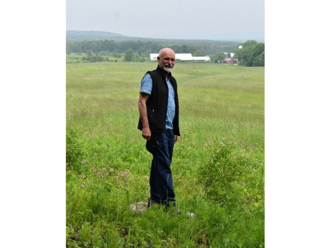 Tony Ó Floinn on the land purchased by Pádraig Cúndún