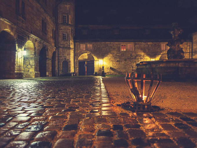 Cobbled courtyard at night