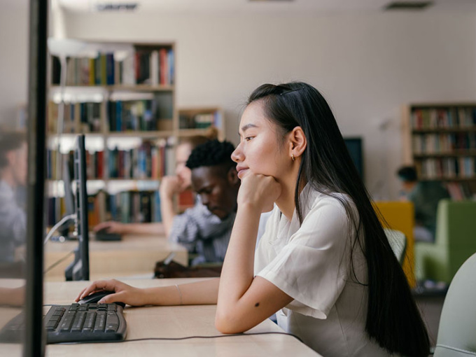 Student sitting at a computer